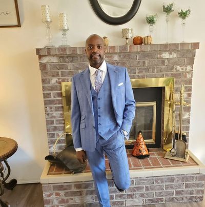 Joseph Person is a key holder at Men’s Wearhouse.  (Courtesy)