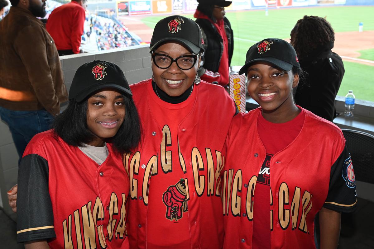 Spokane City Council president Betsy Wilkerson dons a King Carl jersey with her granddaughters at King Carl Night at Avista Stadium. (Spokane Indians)
