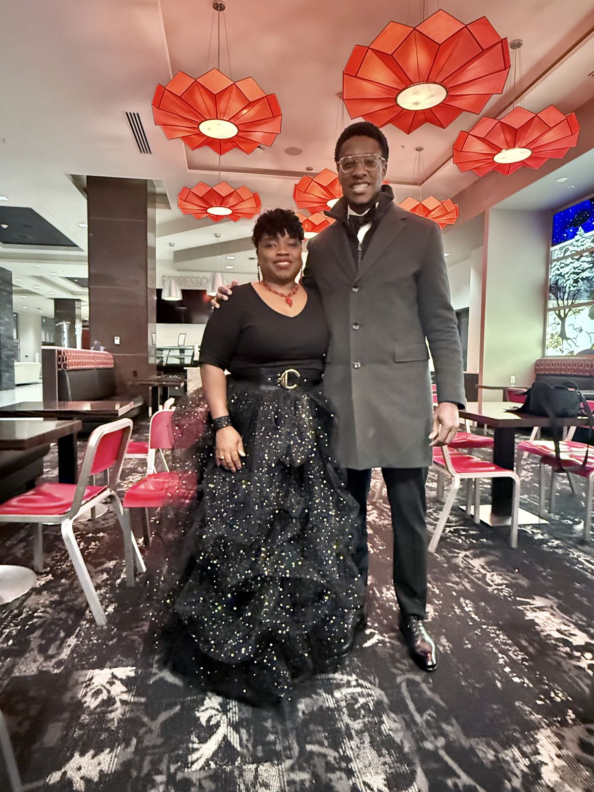 Black Lens editor April Eberhardt poses with Red Lobster CEO Damola Adamolekun.  (Courtesy)