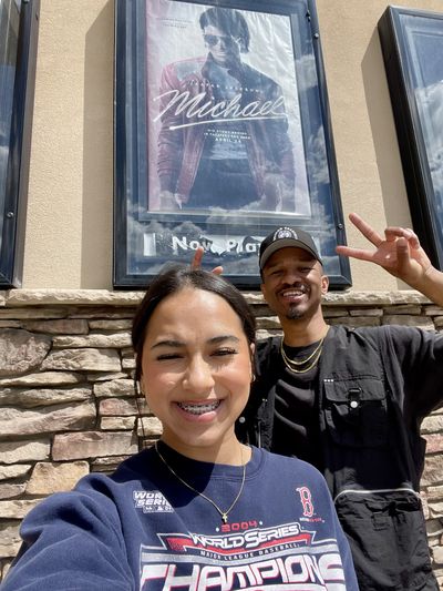Derrick Jenkins and his daughter spend time watching the Michael biopic. 