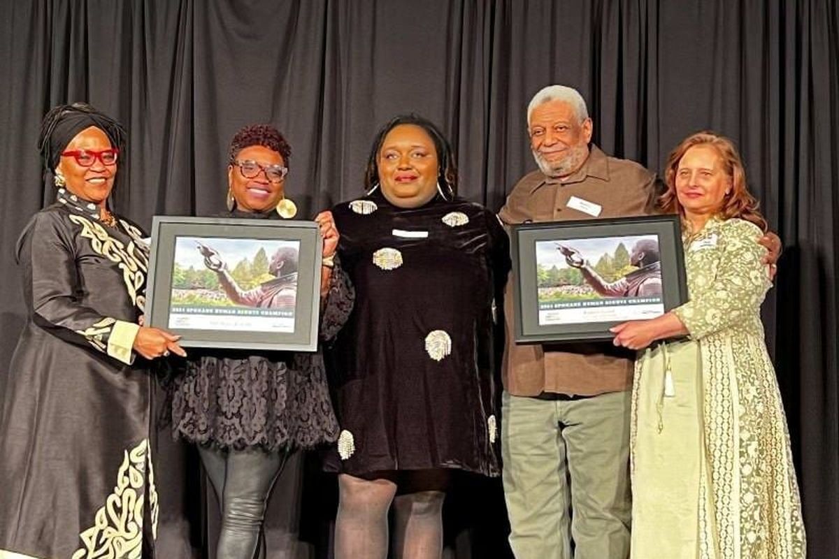 Black Lens editor April Eberhardt, second from left, and Black Lens contributor Bob Lloyd, second from right, are honored as the 2024 Spokane Human Rights Champion Awardees. (April Eberhardt/The Black Lens)