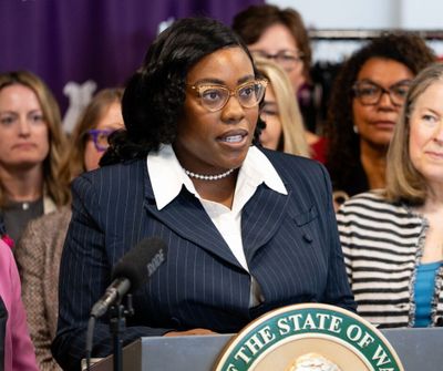Brittany Gregory, Executive Director of WA Women’s Commission, speaks during the signing of Executive Order 26-01 press conference.  (Washington State Women’s Commission)