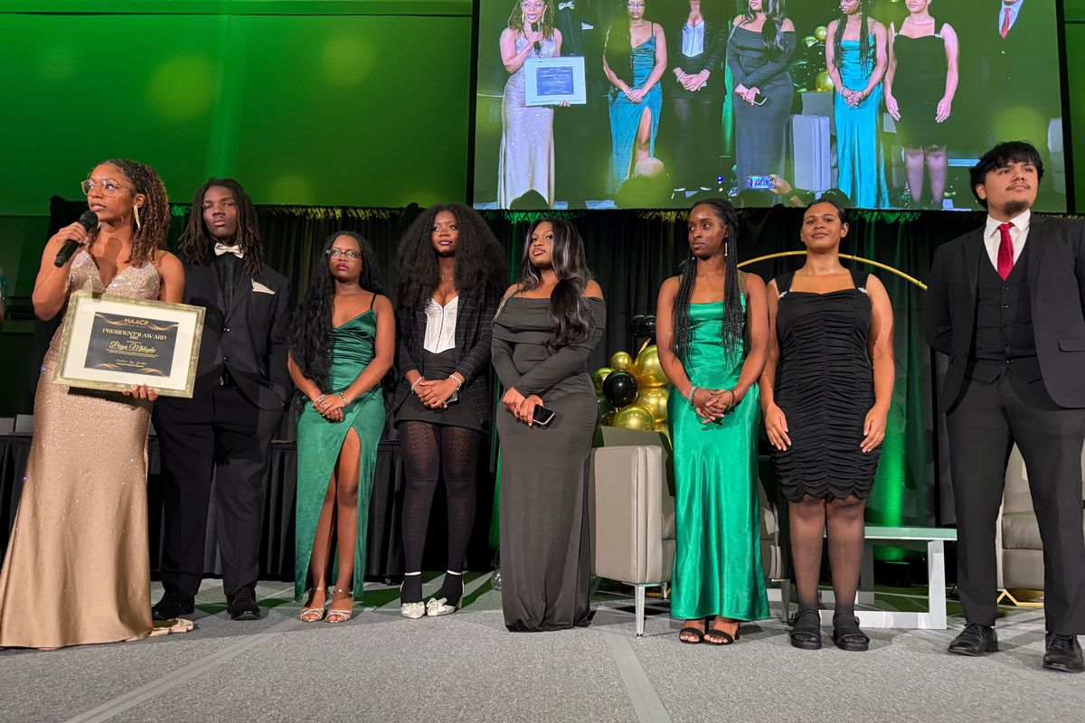 Youth Council Adviser Priya Mhlophe stands with other council members as she is awarded the 2025 NAACP President’s Award at the NAACP Freedom Fund Gala.  (Courtesy)